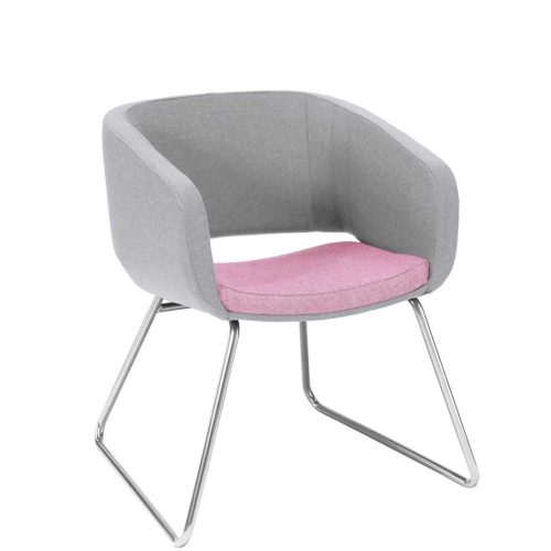 Breakout chair with pale pink cushioned seat and pale grey back and sides