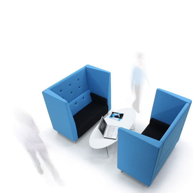 Black and blue booth seating with white oval coffee table