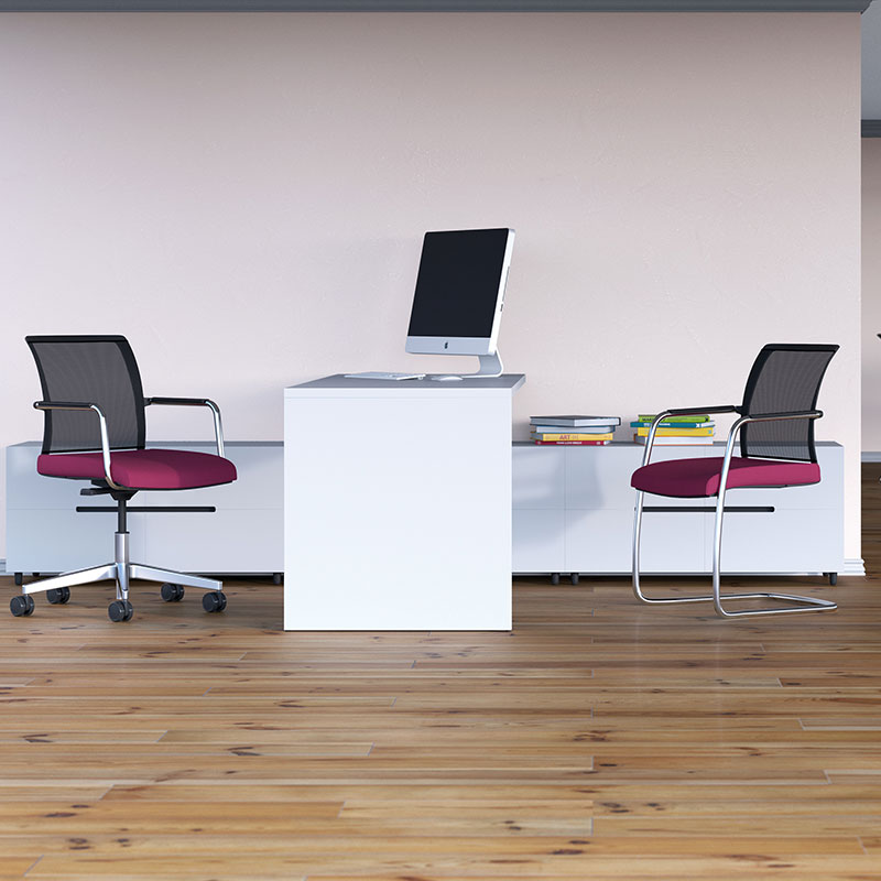 Two pink and black office chairs sitting either side of a white desk