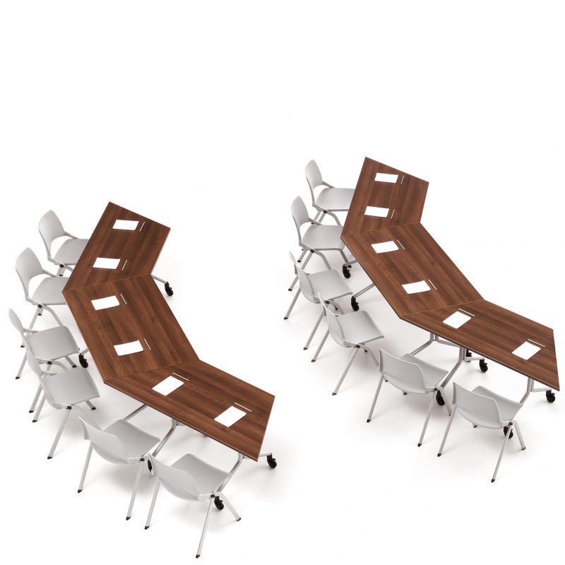 Two clusters of tables and chairs arranged for a meeting